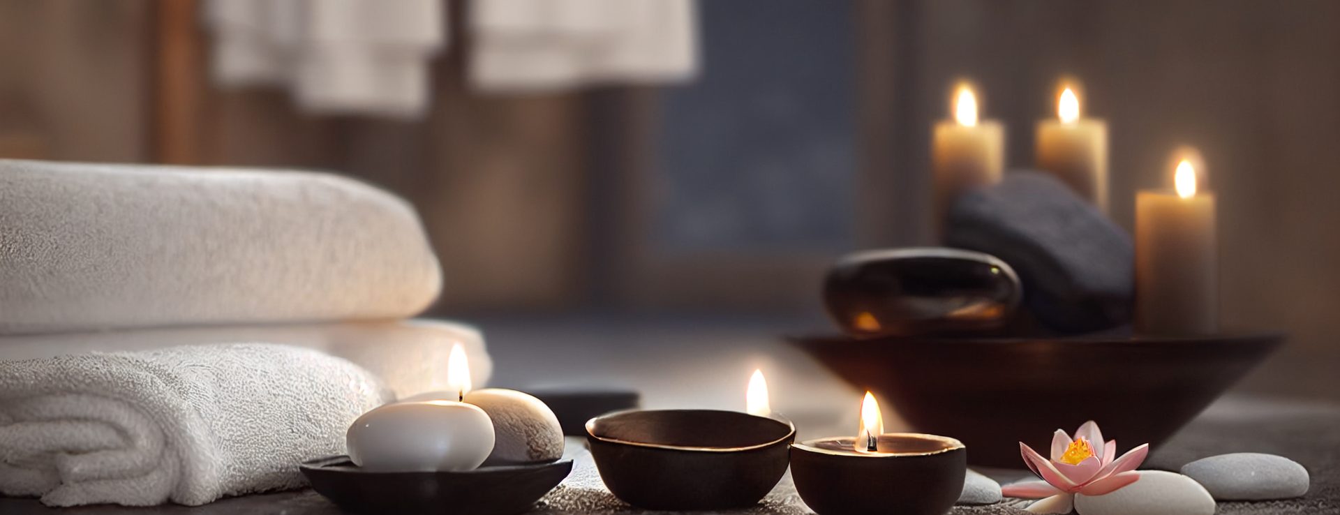Bougies, galets et serviettes dans une ambiance apaisante